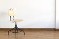 Single  wood stool on wooden floor Royalty Free Stock Photo