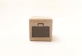 Single wooden block cube featuring a gray briefcase work icon Royalty Free Stock Photo