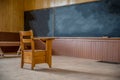 A single wooden desk in an abandoned, one-room schoolhouse on the prairies in Saskatchewan Royalty Free Stock Photo