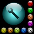 Single wrench icons in color illuminated glass buttons