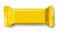 A single yellow candy bar wrapper on a white background Royalty Free Stock Photo