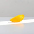 Single Yellow Mango Slice on White Royalty Free Stock Photo