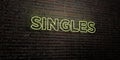 SINGLES -Realistic Neon Sign on Brick Wall background - 3D rendered royalty free stock image