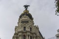 Singular building of street alcala in the center of the city of