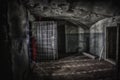 Sinister and creepy interior of abandoned and rotten mental hospital