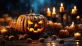 Sinister Halloween composition in dark tones. Spooky pumpkin jack-o-lanterns, burning candles, beads, blurred background