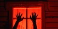 Sinister Zombie Hands Lurk Outside A Window, Bathed In Eerie Red Light