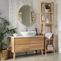 Sink bowl on chest of drawers, mirror and shelving unit in bathroom