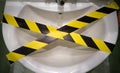 The sink is covered with a forbidding film, the bathroom is forbidden to use