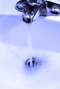 Sink Faucet Water Flowing Down Drain Royalty Free Stock Photo