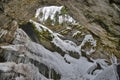 Sink-hole entrace with stalactites at the entrance the Scarisoara cave, Romania Royalty Free Stock Photo