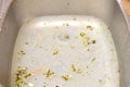 The sink in the kitchen is clogged and the water does not go down the drain. Clogged sink Royalty Free Stock Photo