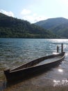 Sinking boat in water lake Royalty Free Stock Photo