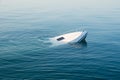 Sinking modern large white boat goes underwater