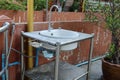 Sinks and faucets in public places for hand cleaning to prevent germs.