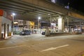 Sinopec gas station under overpass at night