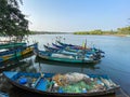 Fishing boats parked on the banks of the Nerul river in the village of Sinquerim