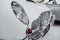 SINSHEIM, GERMANY - OCTOBER 16, 2018: Technik Museum. Bumper and front headlights of good polished white vintage car