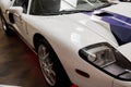 SINSHEIM, GERMANY - OCTOBER 16, 2018: Technik Museum. Close up view. Great white sport automobile with blue lines parked