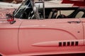 SINSHEIM, GERMANY - OCTOBER 16, 2018: Technik Museum. Side view of the rare pink cabriolet. Beautiful classic