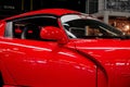 SINSHEIM, GERMANY - OCTOBER 16, 2018: Technik Museum. Sport car standing indoor. Polished red colored surface