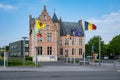 Sint-Gillis-Waas, East Flemish Region, Belgium - Town hall and square with local, Flemish and Belgian flags