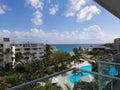 Sint Maarten Philipsburg April 20 2021 view of Sonesta Maho Beach Resort`s apartments. Beautiful blue sky and ocean Royalty Free Stock Photo