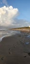 Beach view in beautiful stormy weather with blue sky before sunset Royalty Free Stock Photo