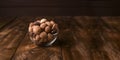 Sinterklaas. Festive cookies pepernoot for a traditional Dutch feast. Treat for St. Nicholas on a wooden background.