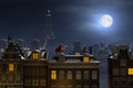 Sinterklaas and the Pieten on the rooftops at night Royalty Free Stock Photo