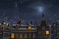 Sinterklaas and the Pieten on the rooftops at night Royalty Free Stock Photo