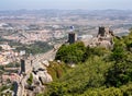 Tourists walking the walls of the Moors Castle on the hill above Sintra in Portugal