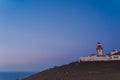 Sintra, Portugal - 01/05/19: Cape Roca lighthouse Cabo da Roca. Blue night sky and atlantic ocean, Westernmost Europe