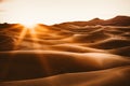 Sinuous Merzouga dunes and sunlight at sunrise, Sahara Desert, Morocco Royalty Free Stock Photo