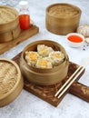 Siomay with topping carrot in klakat / bamboo Royalty Free Stock Photo