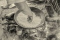 Siona Woman Cooking Cassava In Traditional Kitchen