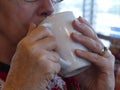 Woman Sipping Coffee Royalty Free Stock Photo