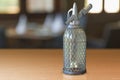 Siphon Seltzer Bottle on the wooden table, 3D rendering