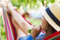 Sipping a Cool Drink on a Lazy Summer Day in a Hammock Royalty Free Stock Photo