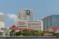 Siriraj hospital building and red roofed houses along Chao Phraya River, Bangkok Thailand Royalty Free Stock Photo