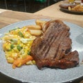 Sirloin steak with mix vegetable and potato wedges