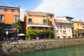 Sirmione, Italy - Aug 13, 2021: beautiful pedestrian streen with wintage houses in Sirmione, lake Garda, Italy