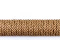 A sisal rope cat scratching post on white background. Copy space for text