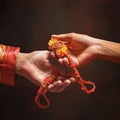 A sister is binding rakhi on her brother hand on the festival of raksha Bandhan, Rakshabandhan.