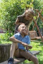 Girl loves her brother,sister embracing her brother outside Royalty Free Stock Photo