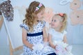 Sister having fun in the bad and sharing moments of love. Royalty Free Stock Photo