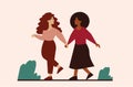 Two flat confident women walk together and hold hands. Black female gets supported by her friend.