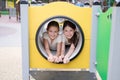 sisterhood, friendship. two charming teen girls having fun on a modern playground. sister, bffs communication