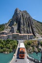 A truck drive over the bridge accross river Durance at Sisteron