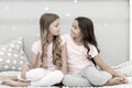Sisters or best friends spend time together in bedroom. Girls having fun together. Girlish leisure. Sisters friends Royalty Free Stock Photo